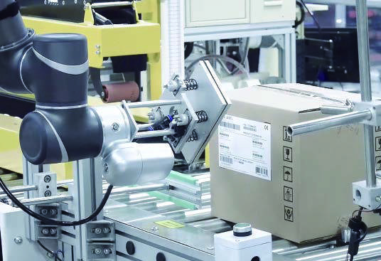TM Robot solving a packaging issue and automating the packaging industry using gripper technology.