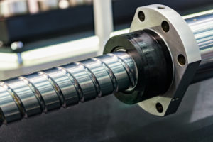 Ball screw for transferring the caliper into motion and feeding